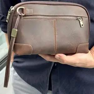 남여공용 소가죽 파우치 클러치백 스트랩 블랙