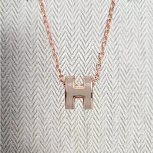 에르메스 미니 팝아슈 펜던트 로즈 골드 & 마론 글라세 H147992FO55 150776004