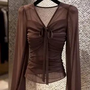 [아리엘스타일]시스루 셔링리본 슬림핏티 돈클레슬림티