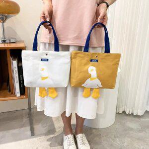 J2K 코믹 오리 캔버스 토트백 에코 가방 보조 런치 캐릭터 미니 숄더백