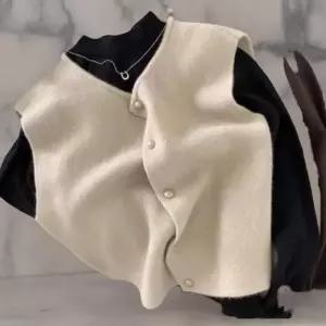 [옷자락]여성 라운드넥 버튼 소프트 울 루즈핏 조끼