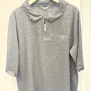 [크로커다일레이디]체크 자가드 쭈글이 블라우스형 티셔츠