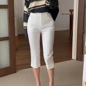 [옷자락]여자 7부 카프리팬츠 밑트임 검정 흰색 슬림 반바지