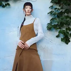 [롯데백화점]씨씨콜렉트 인조스웨이드 레이어드 탑_C254MST031