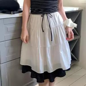 [하프클럽/]여자 봄신상 폴리 밴딩 티어드 미디 스커트