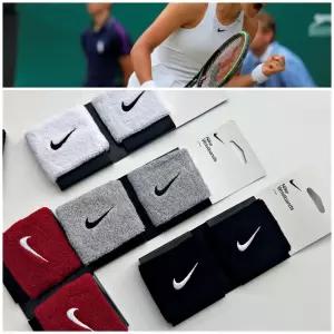 나이키 스우시 손목밴드 보호대 손목아대 스우시밴드 보호대 아대