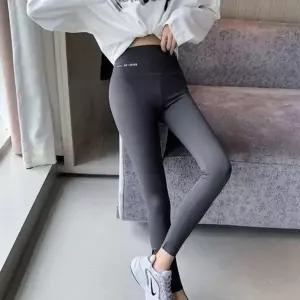 여성 슬림 스타일 발목 심리스 컷팅 스포츠 레깅스 (HSJ-WFFQLQJ