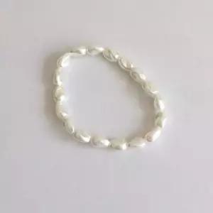 [라일리의류] Rly twist pearl bracelet