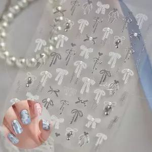 네일아트 진주로 포인트를 준 레이스 리본 엠보스티커