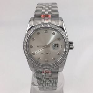 NH05 패셔너블한 31mm 여성용 오토매틱 시계 다이아몬드 베젤 및 사파이어 크리스탈 햇빛에 노출된 화이트