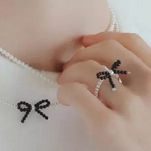 [제이로렌]제이로렌 블랙 오닉스 원석 은볼 리본 반지 R0667