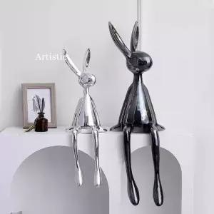 모던하고 미니멀한 디자인의 토끼 좌상 장으로 집 현관이나 입구 또는 와인