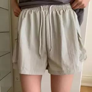 [옷자락]여자 허리밴딩 리본자수 포켓 카고 반바지_P421531555