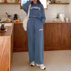 [신세계라이브쇼핑][옷자락] 여자 라운드넥 프린팅 크롭 맨투맨 밴딩 팬츠 세트