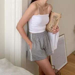 [신세계라이브쇼핑][옷자락] 여자 슬림핏 사이드 셔링 캡 크롭 끈나시