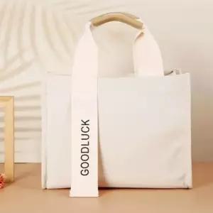 토드백 에코 캔버스 미니 크로스 가방 아이보리