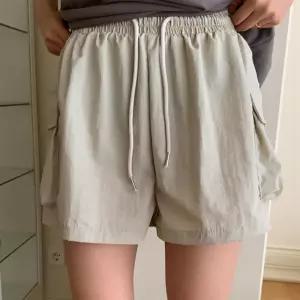 여자 허리밴딩 리본자수 포켓 카고 반바지