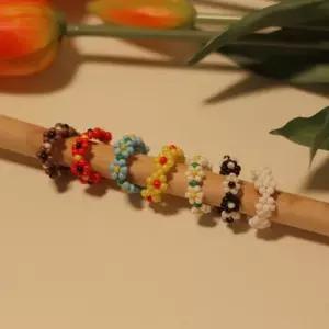 [옷자락]여자 데일리 컬러 비즈 꽃 삐삐 레이어드 반지