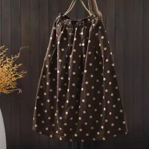 스트레인지 스커트 롱 여성 가을 데일리룩 중기장 도트 프린트 A라인 KUK3