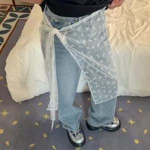 [하프클럽/]여자 리본 패턴 시스루 레이스 랩 스커트