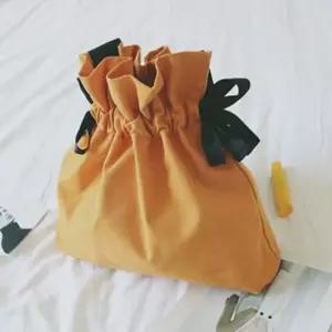 WL 귀여운 복조리백 깔끔한 무지 리본에코백 데일리 캔버스백 넉넉한 수납공간 숄더백