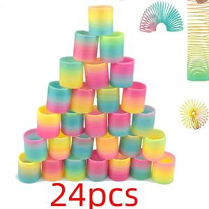 24PCS 레인보우 매직 스프링 서클 장난감 어린이 생일 파티는 손님을 선호합니다 경품 작은 선물 Pinata 필러 유연한 재미 있은 장난감