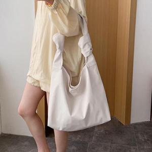 [홀리지]노티드 데일리 꼬임 스트랩 숄더 에코백