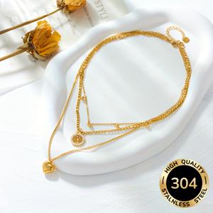 TEMU 사랑과 생명의 나무를 상징하는 펜던트가 특징인, 스타일리시하고 세련된 골드 스테인리스 스틸 멀티 레이어 목걸이입니다. 이 고급스럽고 다재다능한 제품은 여성들이 다양한 상황, 특히 일상적인 외출에 착용하기에 완벽합니다.