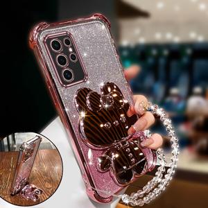 TEMU 휴대폰 케이스 - 삼성 갤럭시 S25 울트라와 호환되는 이 휴대폰 케이스는 반짝이는 디자인, 충격 방지 코너, 스크래치 방지 기능을 갖추고 있습니다. 토끼 모양의 메이크업 거울 스탠드와 손목 스트랩 랜야드가 포함되어 있습니다.