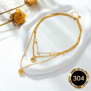 TEMU 사랑과 생명의 나무를 상징하는 펜던트가 특징인, 스타일리시하고 세련된 골드 스테인리스 스틸 멀티 레이어 목걸이입니다. 이 고급스럽고 다재다능한 제품은 여성들이 다양한 상황, 특히 일상적인 외출에 착용하기에 완벽합니다.