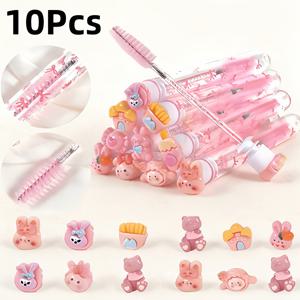 TEMU 귀여운 핑크색 만화 스풀 브러쉬 10개 세트 (랜덤 디자인), 스타일리시한 리본 매듭 먼지 방지 튜브 케이스 포함. 휴대용 눈썹 빗 및 속눈썹 연장 앱플리케이터는 전문가용 살롱 또는 프로젝트에 적합한 그루밍 도구입니다.