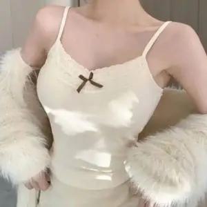 [하프클럽/]슬림핏 레이스 리본패드 끈나시 크롭 여성용 여름나시