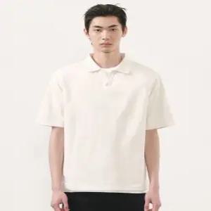 무신사 스탠다드 슬릿 넥 피케 폴로 셔츠 크림 86404081