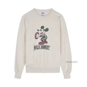 [와일드 동키] FW25 공용 미키 풋볼 맨투맨 FG MIKY FOOTBALL NATURAL 119208