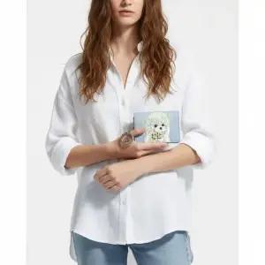 가니 GANNI A6777 326 푸들 로고 보우 플랩 카드지갑
