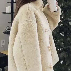 [디작소] 여성 리버시블 양면 절개 무스탕 자켓