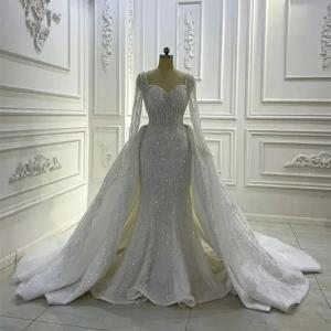 Customzied 럭셔리 반짝이 현대 연인 무거운 구슬 라인 석 인어 웨딩 드레스 오버 스커트 긴 소매 신부 가운