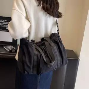 슬링백 메신저백 여자가방 생활방수 남자가방 스트링 3단포켓 나일론가방
