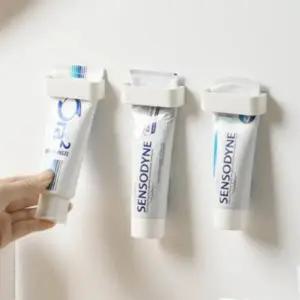 (색상 화이트)무타공 벽걸이 튜브형 치약 거치대 폼클렌징 욕실 수납짜개 2개