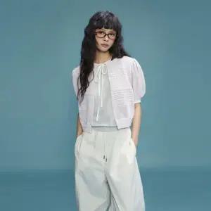 [롯데백화점]DEWL 듀엘리안 시스루 스트랩 가디건 D252KSL270