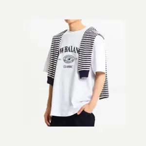 뉴발란스G UNI HERITAGE 반팔티 (SEMI OVER FIT) NBNEE21113-10