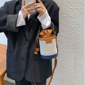 레네 여성 미니 가죽 배색 원통 크로스백 가방