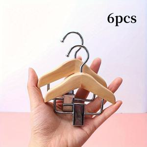 TEMU 파리다비오 스테인리스 클립이 달린 미니 목재 옷걸이 6개 세트 - 내구성 있고 귀여운 소형 의류 및 액세서리 정리에 완벽한 옷걸이, 재미있는 디자인과 고품질 공예