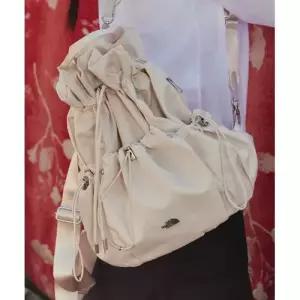 NN2PR61M  데일리숄더백 화이트라벨 보니 팩 미디움 CREAM 5277392