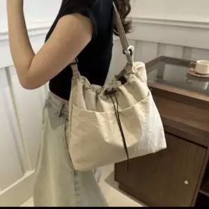 스트링백 숄더백 남녀공용 캐주얼 보조가방 데일리 메신저백 보부상가방 스트링버킷백