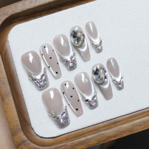 TEMU 은빛 글리터 라인스톤 폴카 도트 캣아이 프레스핏 인조 손톱 10개입. 시원하고 세련된 캐주얼 복장에 완벽. 중간 길이의 사다리꼴 캣아이 디자인. 탈착식. 여성을 위한 선물용으로 적합.