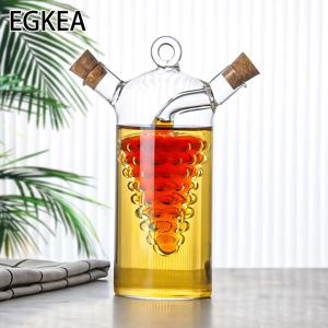 EGKEA, 1개 창의적인 유리 오일 병, 투명 유리 바디에 숨겨진 모래시계와 포도가 특징이며, 분배 시 모양이 흐릅니다. 실용적이고 시각적으로 매력적입니다. 코르크 스토퍼로 누수 방지, 편리한 사용을 위한 기울어진 스파우트
