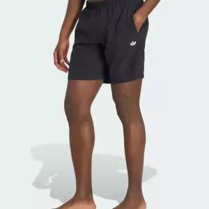 아디다스 ADIDAS 트레포일 에센셜 스윔 쇼츠 KS6927