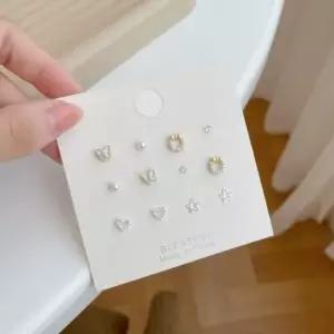 오너클랜 은은한 은침 귀걸이 미니 큐빅 진주 나비 하트 리스 자개 은침 캐주얼 하객룩 겨울신상