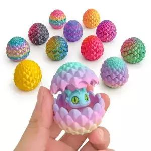 밝은 캔디 색조의 3D 프린팅된 작은 용알 6개. 이 부활절 달걀들은 축제 장식품입니다.